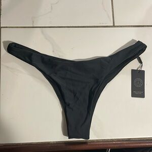Relleciga size medium. Brand new with tags. Bikini bottom